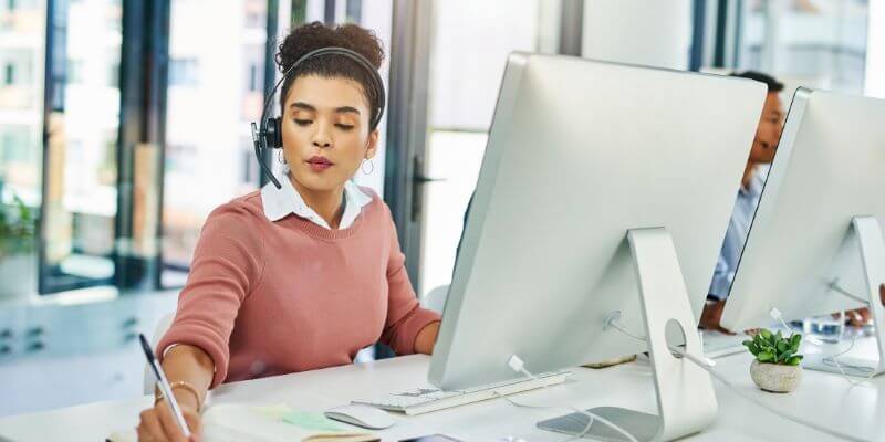 A call center having a meeting about lead follow-up