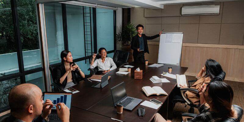 A call center having a meeting about lead follow-up